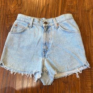 Vintage worn light wash Levi’s high waisted shorts